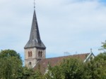 Blick auf die Kirche in Bega von der Barntruper Straße aus. Der aktuelle Kirchbau entstand um die Jahre 1863/64.